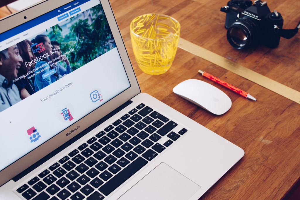 facebook ads on laptop - social network marketing - social media marketing