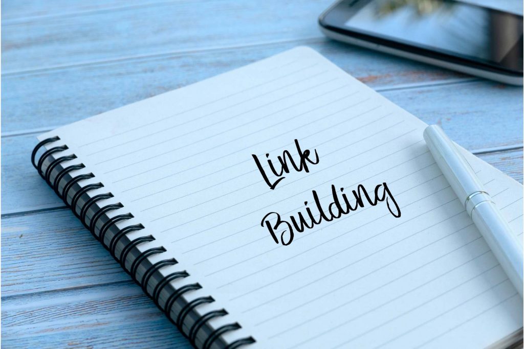 link building writen on a paper