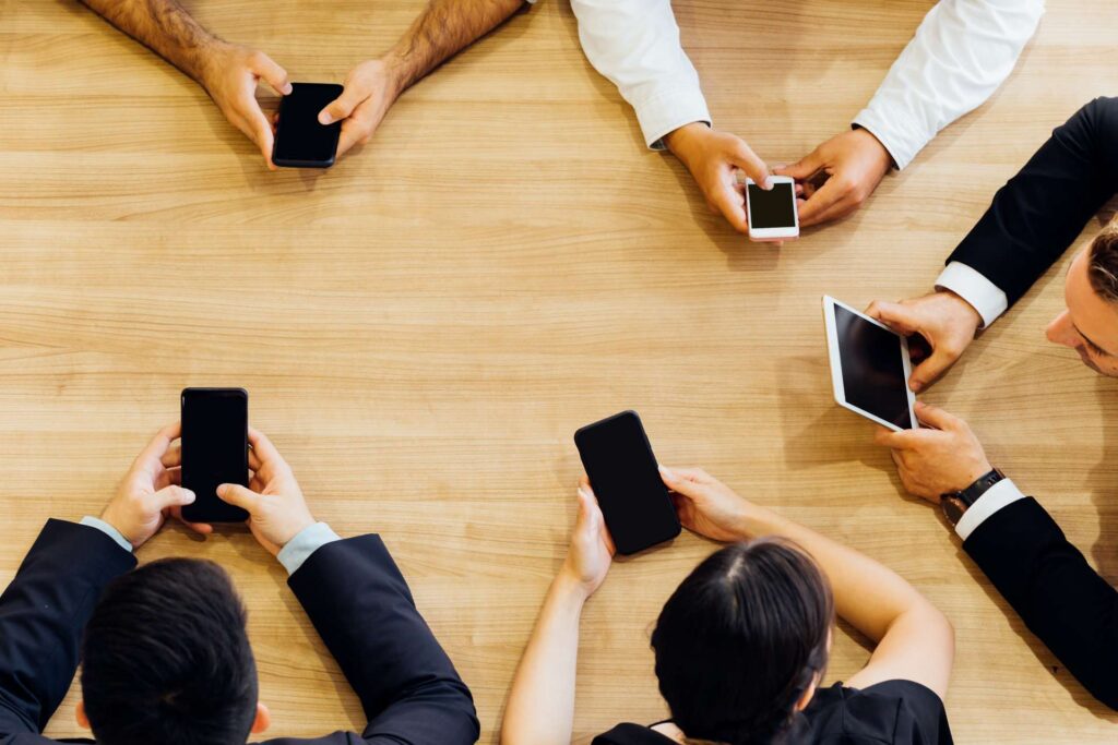 mobile first - people holding mobile phones