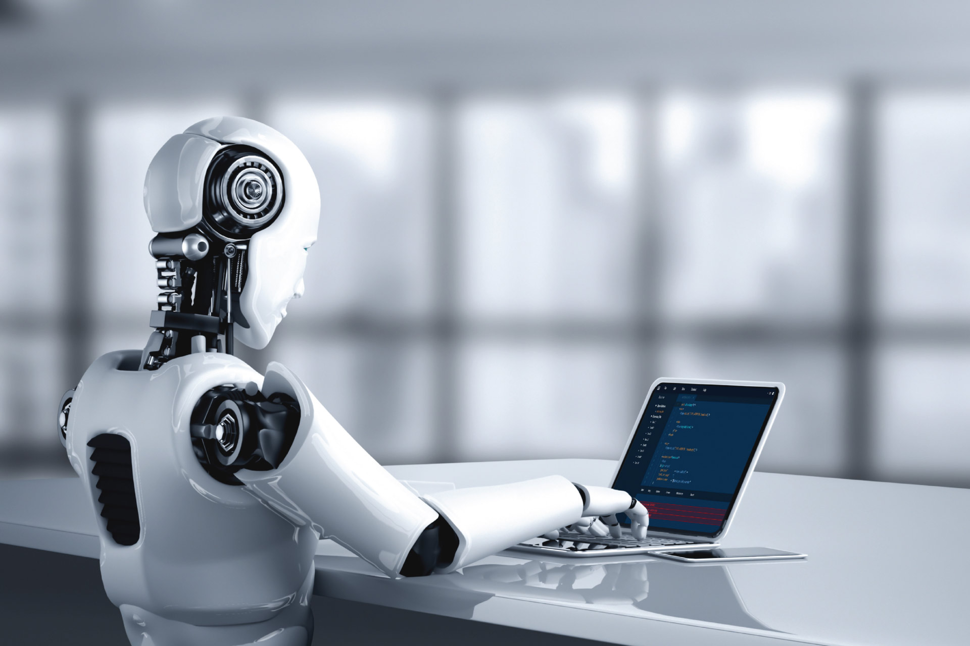 Robot coding on a laptop | AI and the Future of Work - ALX Global